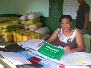 Doctor keeping records of relief given to beneficiaries