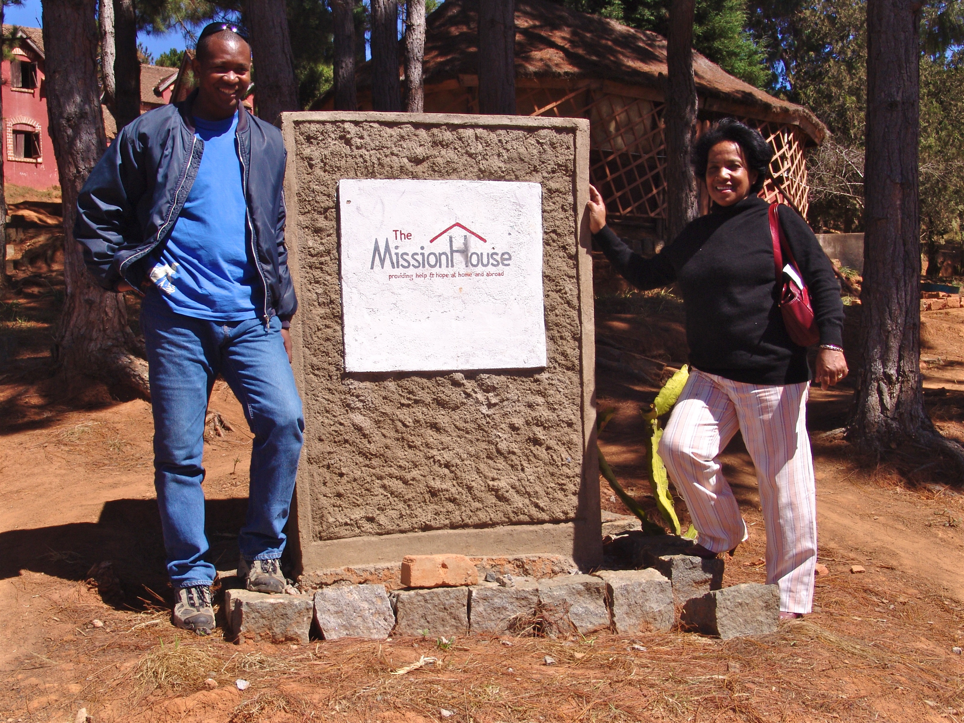 The Mission House management outside the Le Triomphe's Children orphanage