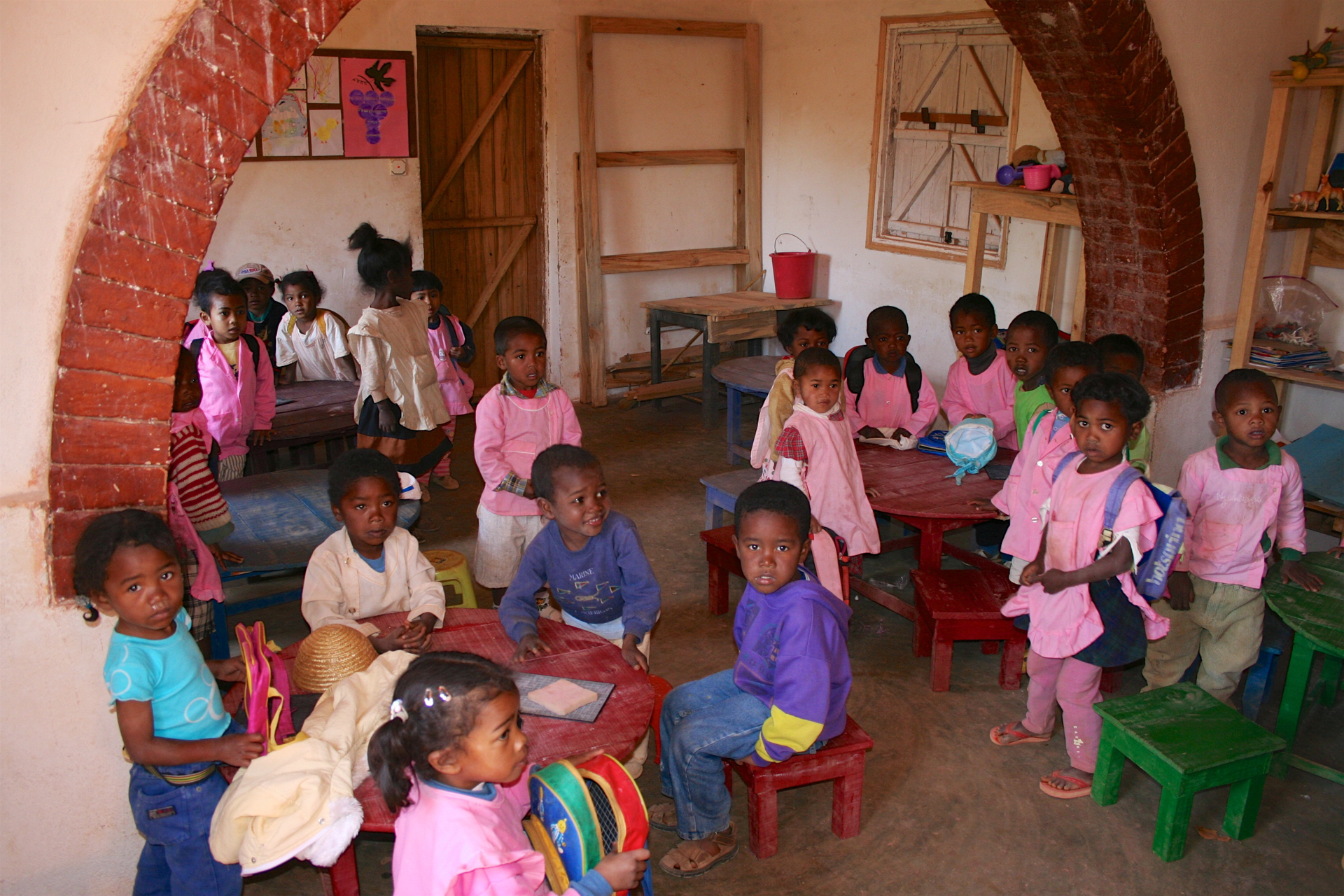 Group of children learning in Le Triomphe's Children's orphanage in Madagascar